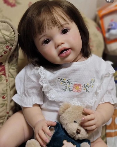 Smiling reborn baby - smiling,