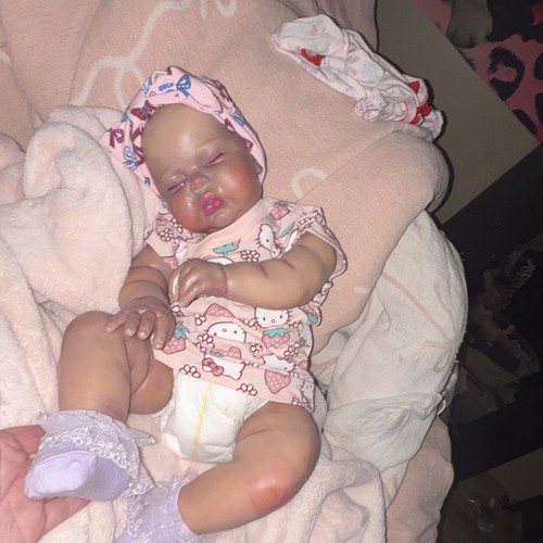 Reborn style vinyl baby - style,